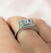 Load image into Gallery viewer, 1 1/2ct Radiant Cut Sideways Set Diamond Halo Engagement Ring in Platinum
