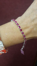 Load and play video in Gallery viewer, 10.66ct Oval Ruby & .28ct Diamond Tennis Bracelet 7" 14k White Gold