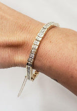 Load image into Gallery viewer, 5 CT. T.W. PRINCESS CUT DIAMOND TENNIS BRACELET in 14K YELLOW GOLD