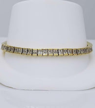 Load image into Gallery viewer, 5 CT. T.W. PRINCESS CUT DIAMOND TENNIS BRACELET in 14K YELLOW GOLD