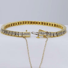 Load image into Gallery viewer, 5 CT. T.W. PRINCESS CUT DIAMOND TENNIS BRACELET in 14K YELLOW GOLD
