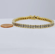 Load image into Gallery viewer, 5 CT. T.W. PRINCESS CUT DIAMOND TENNIS BRACELET in 14K YELLOW GOLD