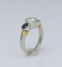 Load image into Gallery viewer, PLATINUM 750 1.17ct DIAMOND .50ct SAPPHIRE THREE STONE BEZEL SET ENGAGEMENT RING