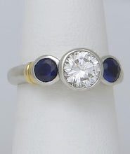 Load image into Gallery viewer, PLATINUM 750 1.17ct DIAMOND .50ct SAPPHIRE THREE STONE BEZEL SET ENGAGEMENT RING
