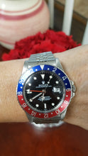 Load and play video in Gallery viewer, 40mm Rolex GMT-Master Pepsi Blue &amp; Red Bezel Stainless Steel Jubilee 16750
