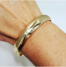 Load image into Gallery viewer, 14k Yellow Gold Hard Oval Bangle Bracelet 10.8mm 6 3/4&quot; (small dent)
