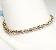 Load image into Gallery viewer, 1.00ct T.W. BAGUETTE &amp; ROUND DIAMOND TENNIS BRACELET in 10K YELLOW GOLD 7&quot;
