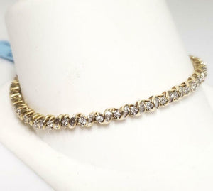 1.00ct T.W. BAGUETTE & ROUND DIAMOND TENNIS BRACELET in 10K YELLOW GOLD 7"