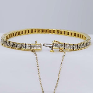 5 CT. T.W. PRINCESS CUT DIAMOND TENNIS BRACELET in 14K YELLOW GOLD