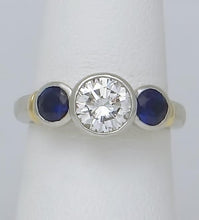 Load image into Gallery viewer, PLATINUM 750 1.17ct DIAMOND .50ct SAPPHIRE THREE STONE BEZEL SET ENGAGEMENT RING
