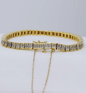 5 CT. T.W. PRINCESS CUT DIAMOND TENNIS BRACELET in 14K YELLOW GOLD
