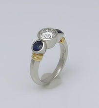 Load image into Gallery viewer, PLATINUM 750 1.17ct DIAMOND .50ct SAPPHIRE THREE STONE BEZEL SET ENGAGEMENT RING
