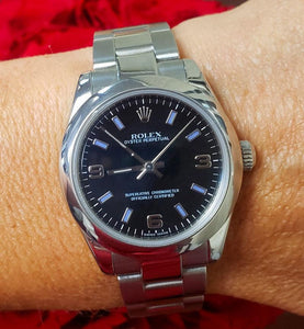 Ladies 31mm Rolex Oyster Perpetual SS Oyster Arabic Automatic Black Dial 177200