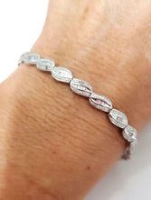 Load image into Gallery viewer, 1.00CT T.W. BAGUETTE &amp; ROUND DIAMOND BRACELET in 10K WHITE GOLD
