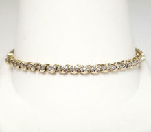 Load image into Gallery viewer, 1.00ct T.W. BAGUETTE &amp; ROUND DIAMOND TENNIS BRACELET in 10K YELLOW GOLD 7&quot;
