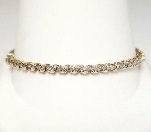 1.00ct T.W. BAGUETTE & ROUND DIAMOND TENNIS BRACELET in 10K YELLOW GOLD 7"