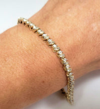 Load image into Gallery viewer, 1.00ct T.W. BAGUETTE &amp; ROUND DIAMOND TENNIS BRACELET in 10K YELLOW GOLD 7&quot;
